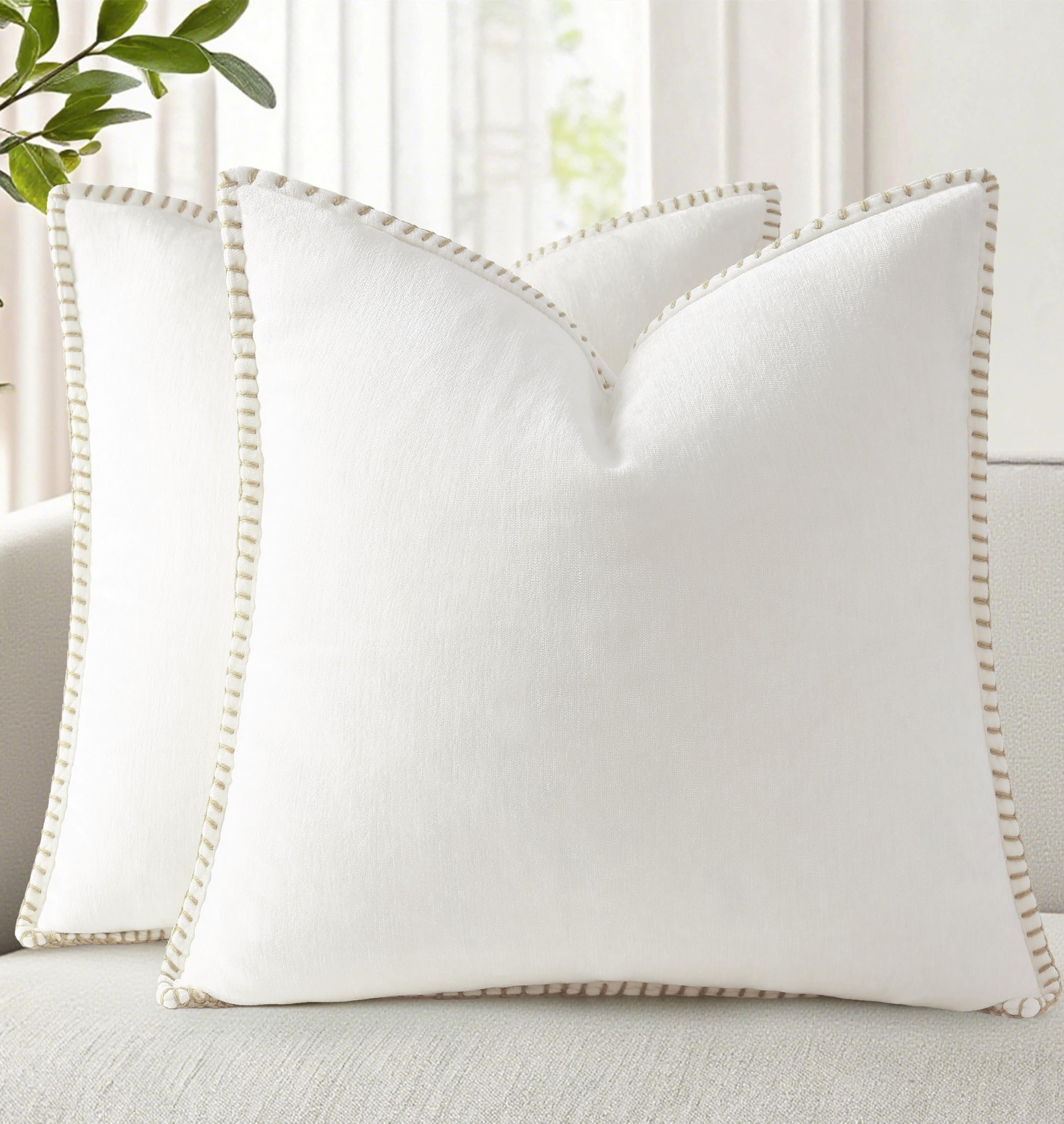 decorUhome Summer Chenille throw pillow cover in cream adds cozy farmhouse charm to a sofa.