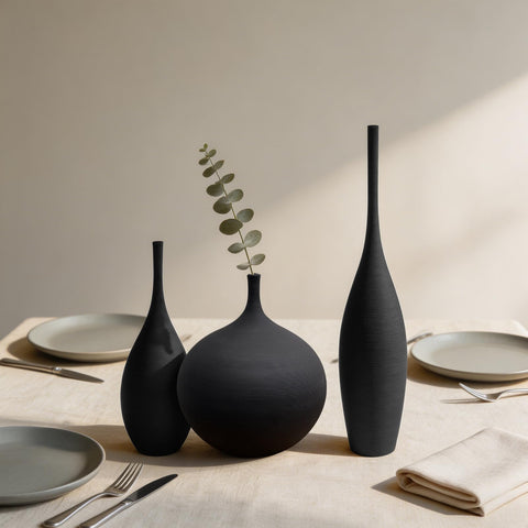 Living room setup featuring DecoVlog black ceramic vases