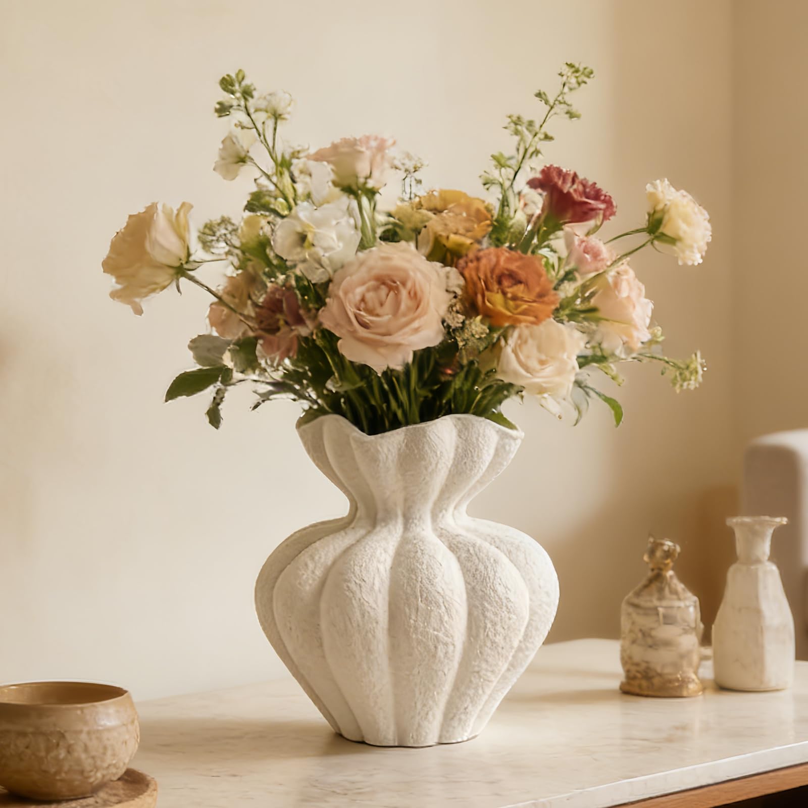 DecoVlog white ceramic vase front view shows modern centerpiece potential.