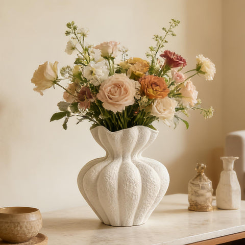 DecoVlog white ceramic vase front view shows modern centerpiece potential.