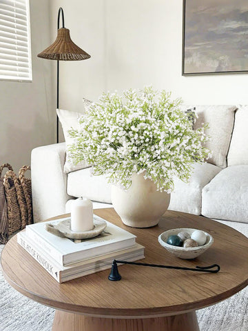DEEMEI delicate small flower heads adding airy texture to vases.