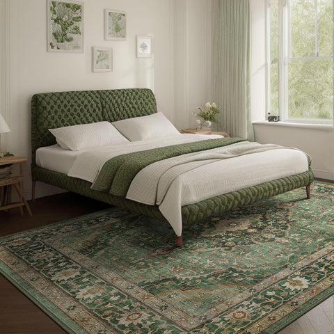 Deerly Green Rug 8x10 in a cozy bedroom setting with distressed pattern