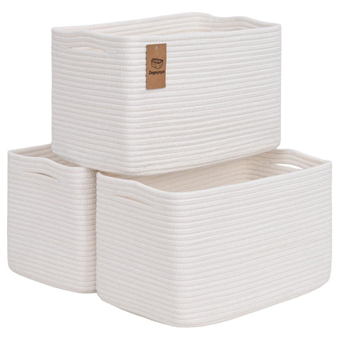Degeyoyo baskets with towels organized on a shelf for a tidy bathroom.
