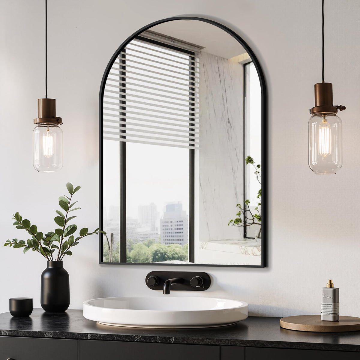 Delma arched mirror 20x30 in black enhances any wall with height
