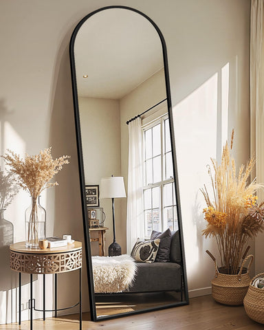 Delma arched full-length mirror with stand for precise dressing checks.