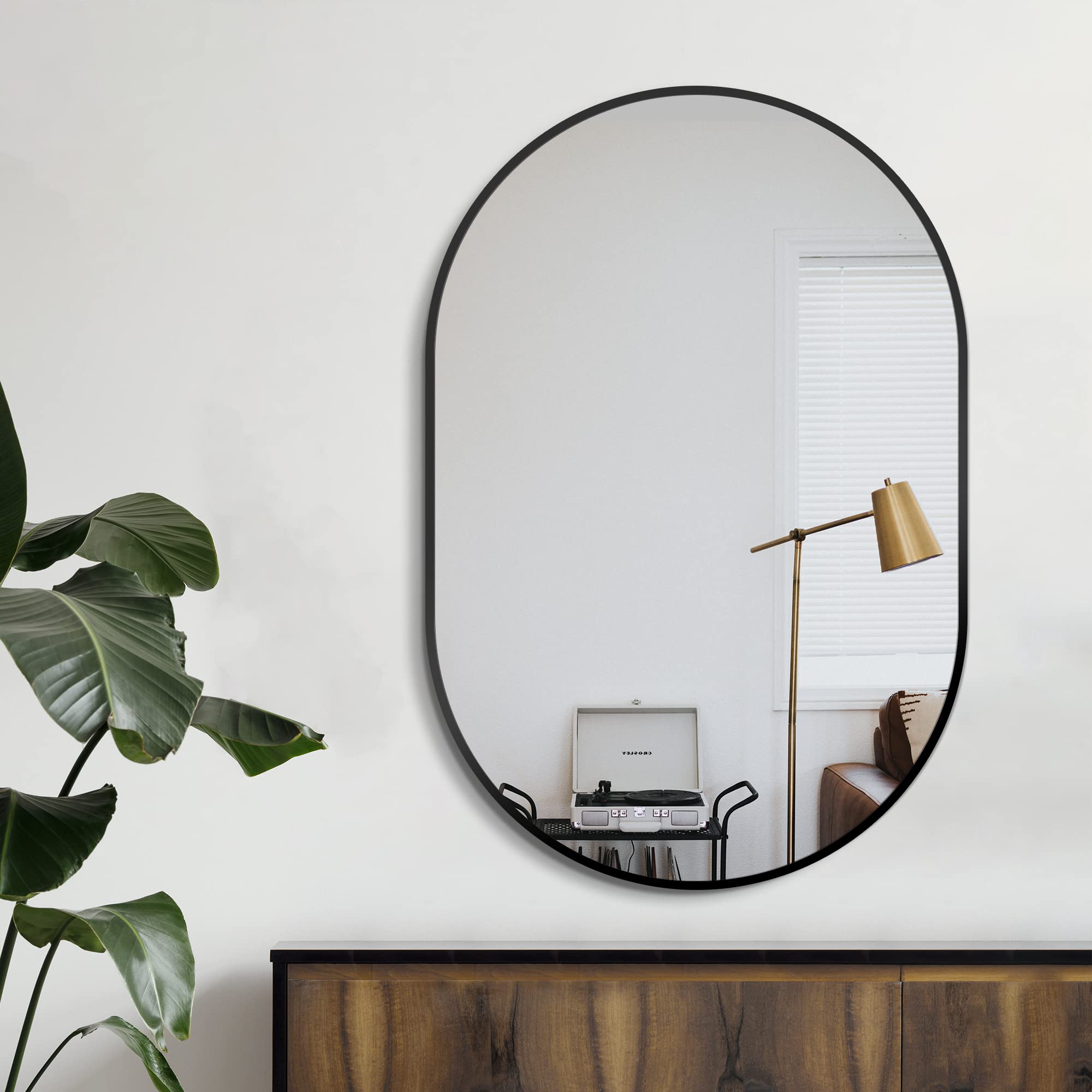 Delma oval mirror 36x24 wall-mount horizontal for wide-angle view in bathrooms.