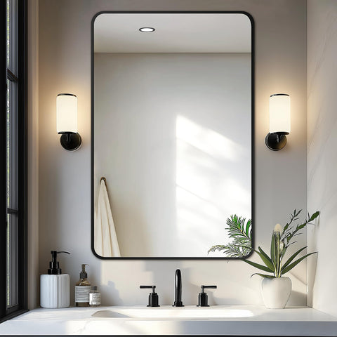 Delma bathroom mirror over sink with black frame for precise grooming.