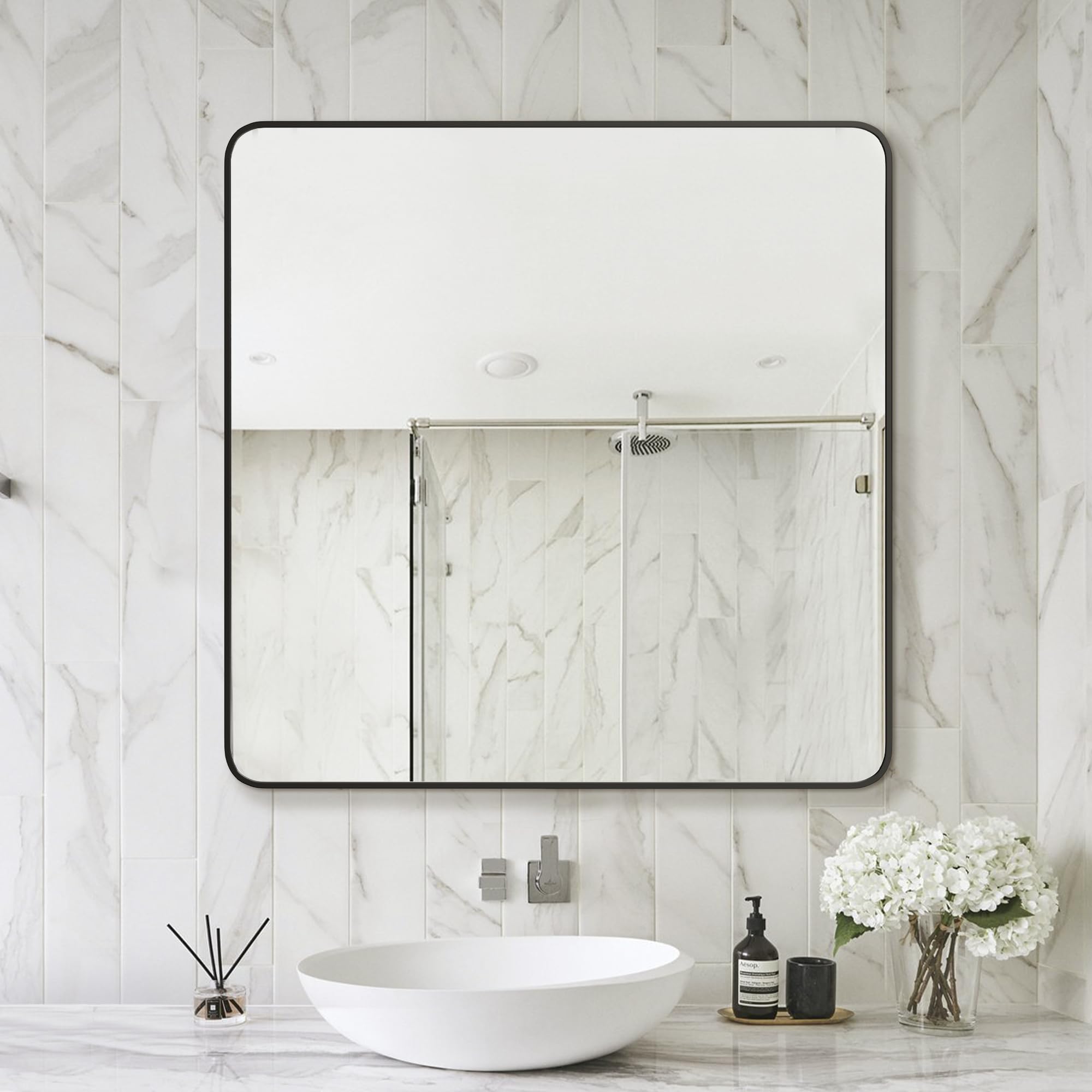 Delma vertical-mount mirror saves wall space while adding sleek style