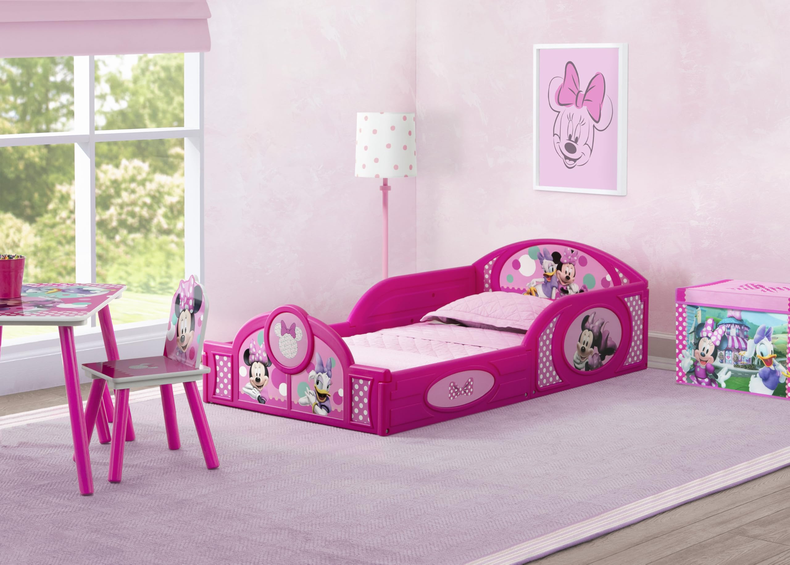 Minnie Mouse toddler bed with low height and guardrails supports safe independent sleep.