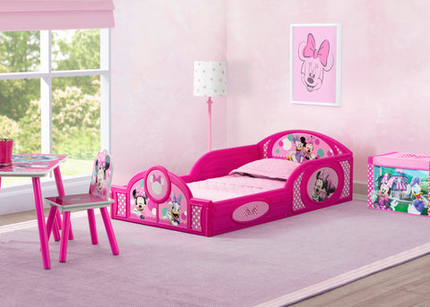 Minnie Mouse toddler bed with low height and guardrails supports safe independent sleep.