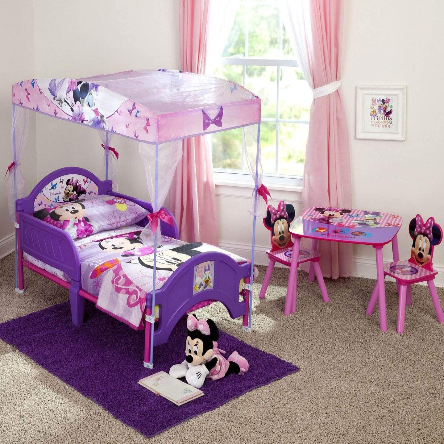 Delta Children Minnie table pink surface offers large space for crafts and homework.