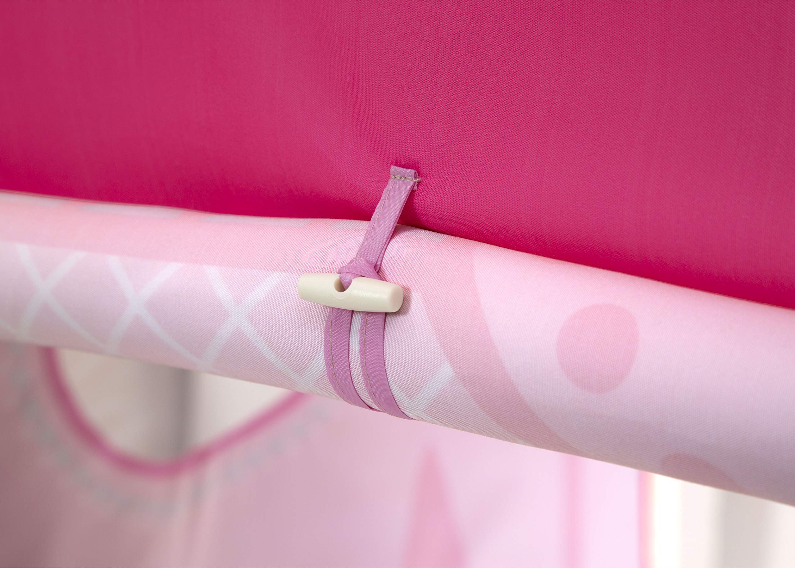 Delta Children Disney Princess loft bed tent machine washable for easy cleanup.