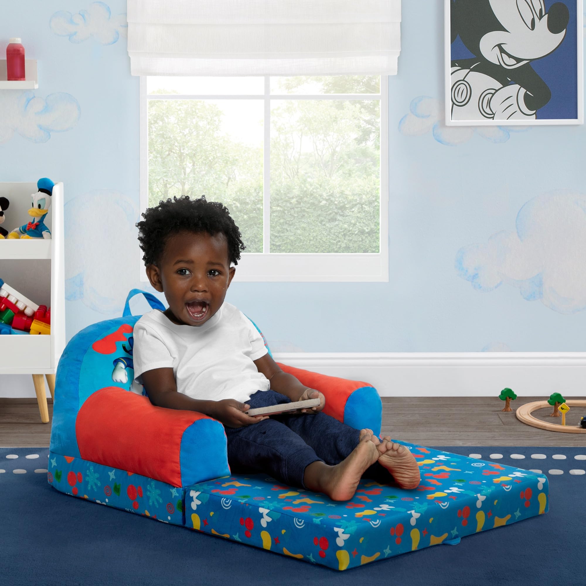Delta Children Mickey Mouse Cozee Buddy Chair open sleeper mode for lounging and naps