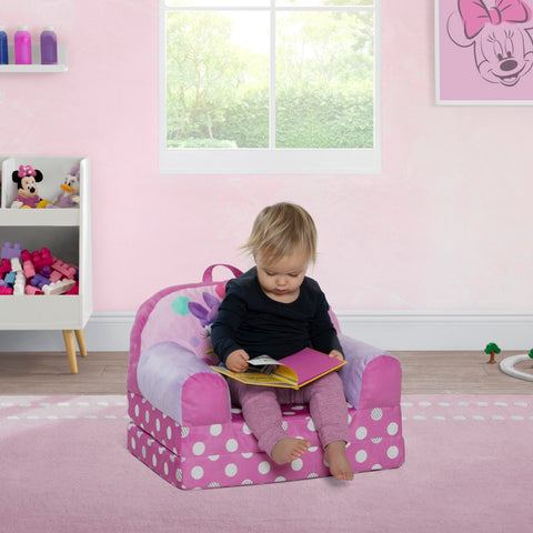 Delta Children Minnie Mouse Cozee Buddy Flip-Out Chair pink is sized for toddlers 18 months and up.