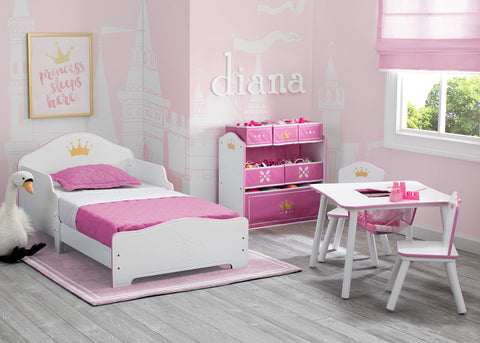 Kids enjoy mealtime, crafts, and play at the Princess Crown table.
