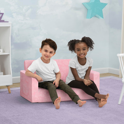 Delta Children Serta Perfect Sleeper Kids 2-Seater Sofa pink convertible in action.