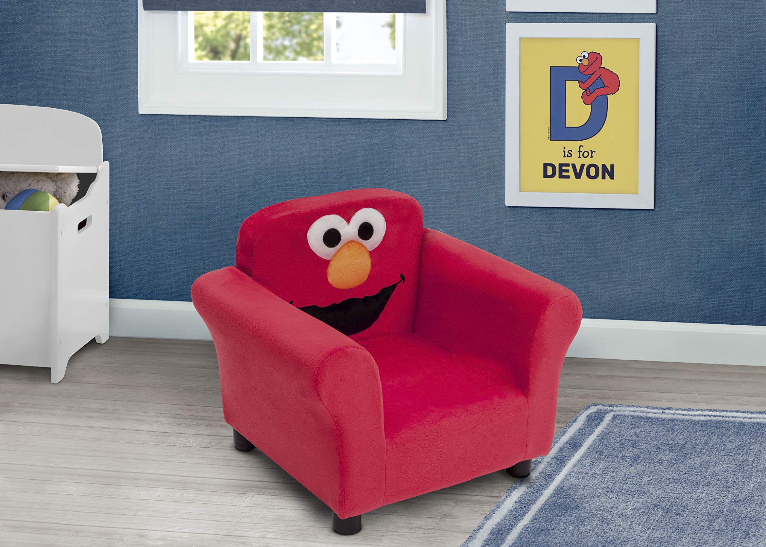 Delta Children Sesame Street Elmo chair foam-seat closeup, soft yet supportive for kids.