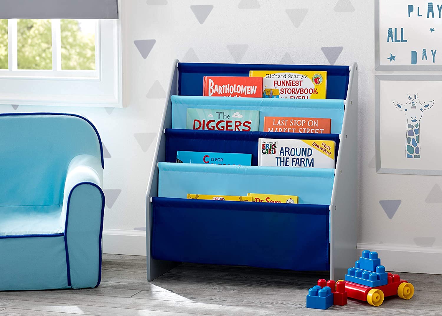 Delta Children Sling Book Rack side-view highlights sturdy wood frame for lasting use.