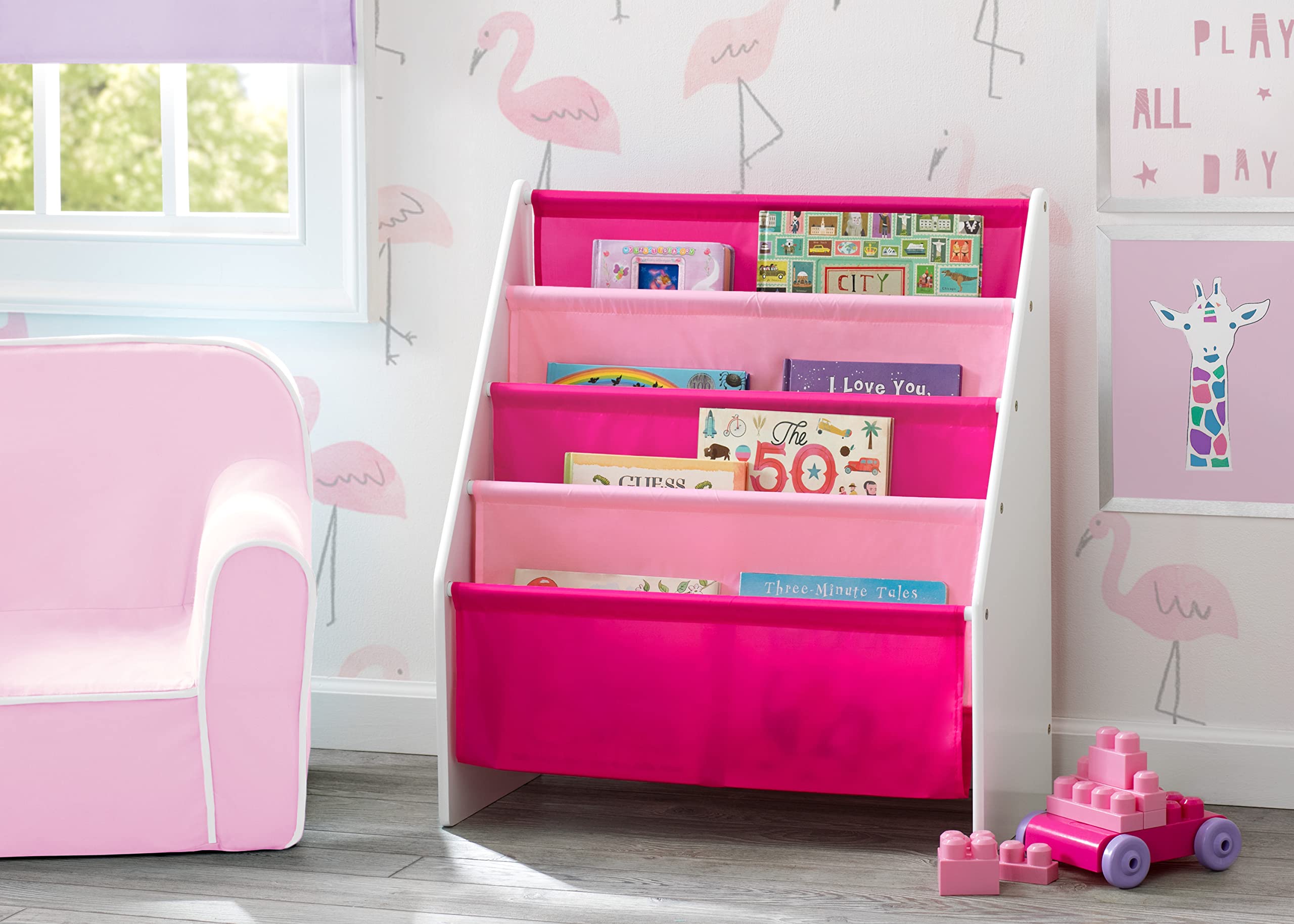 Delta Children Sling Rack Bookshelf at kid-sized height makes selecting books easy.