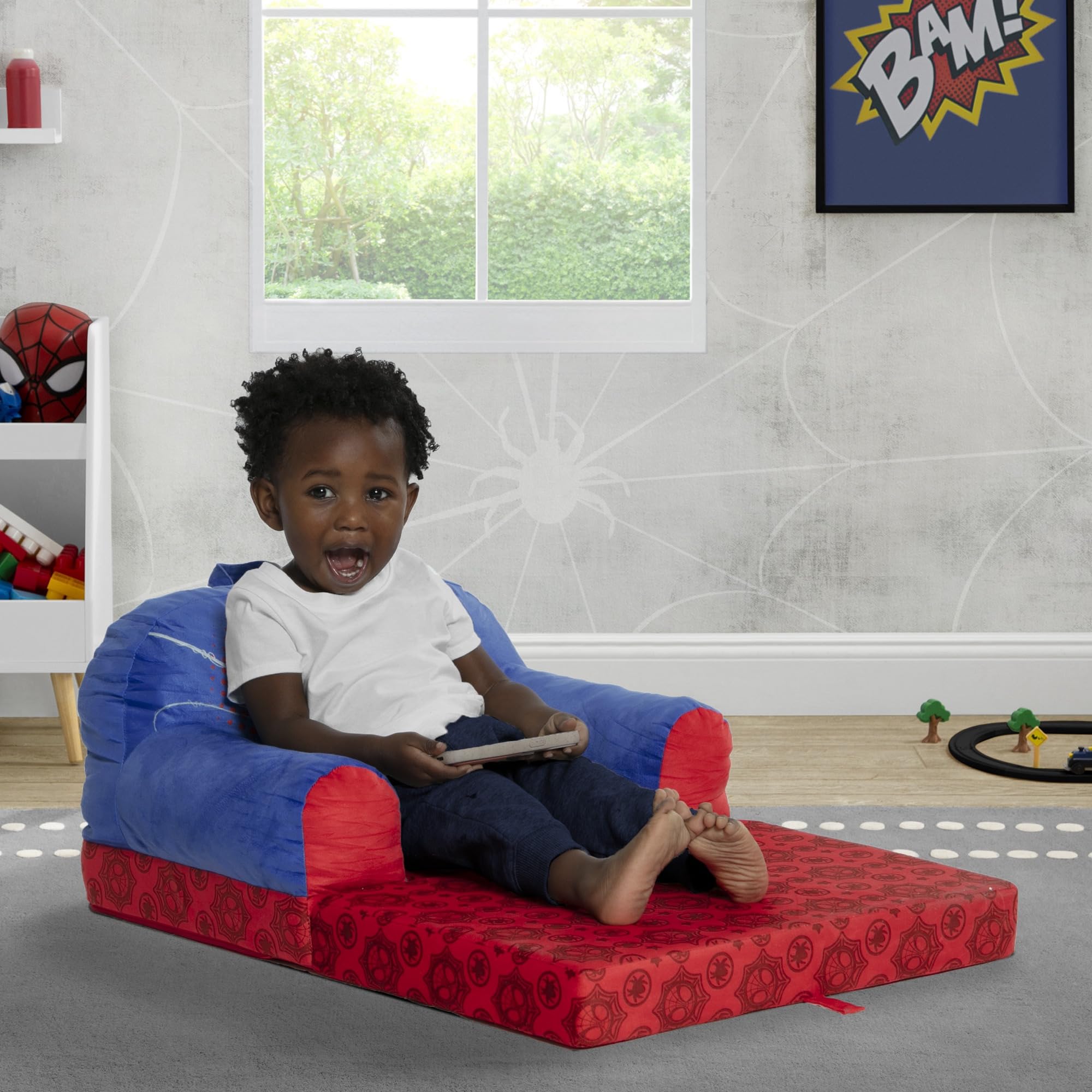 Delta Children Spidey Cozee Buddy chair converted to sleeper mode for naps