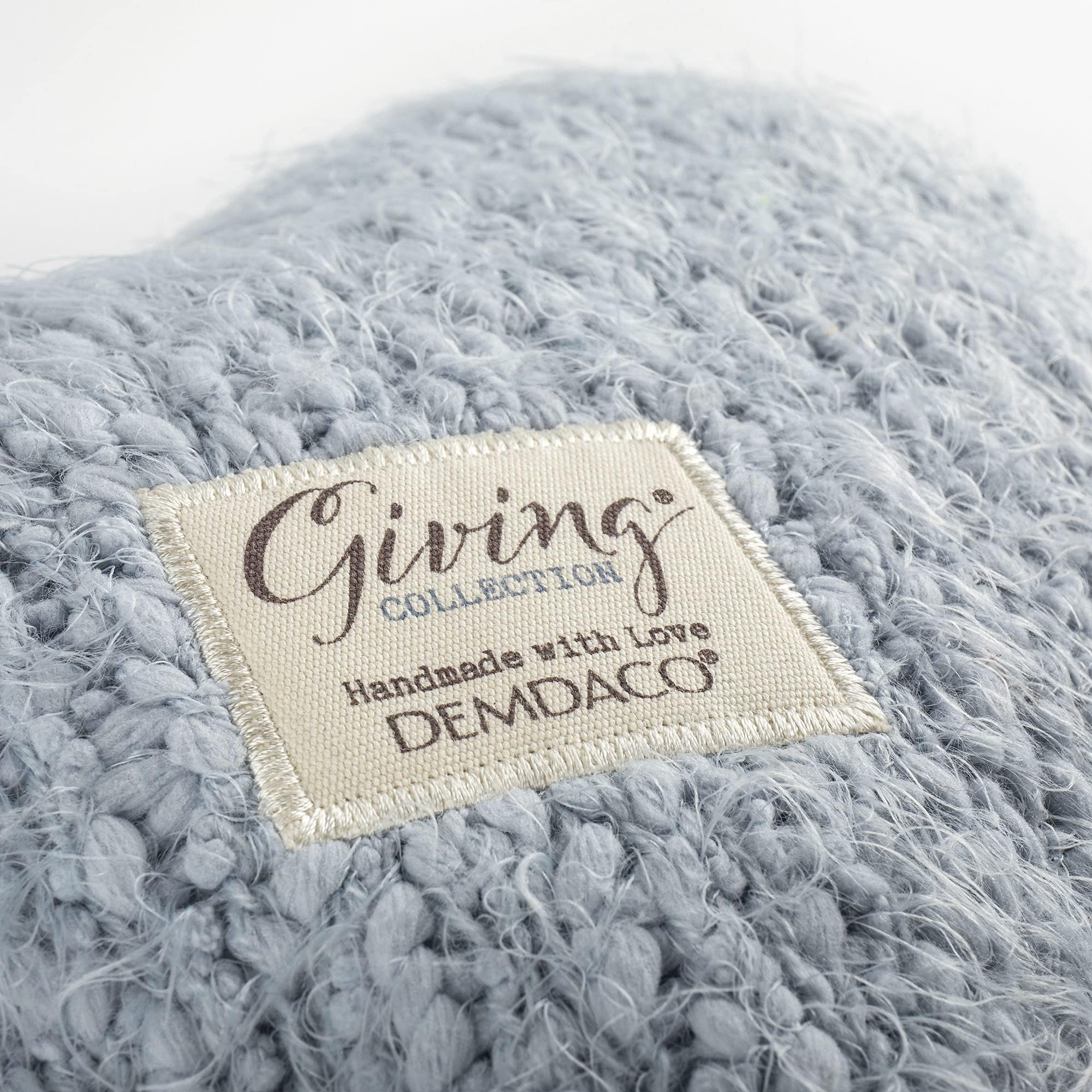 DEMDACO giving heart pillow on bedding adds a luxurious decorative touch.