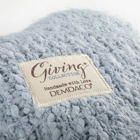 DEMDACO giving heart pillow on bedding adds a luxurious decorative touch.
