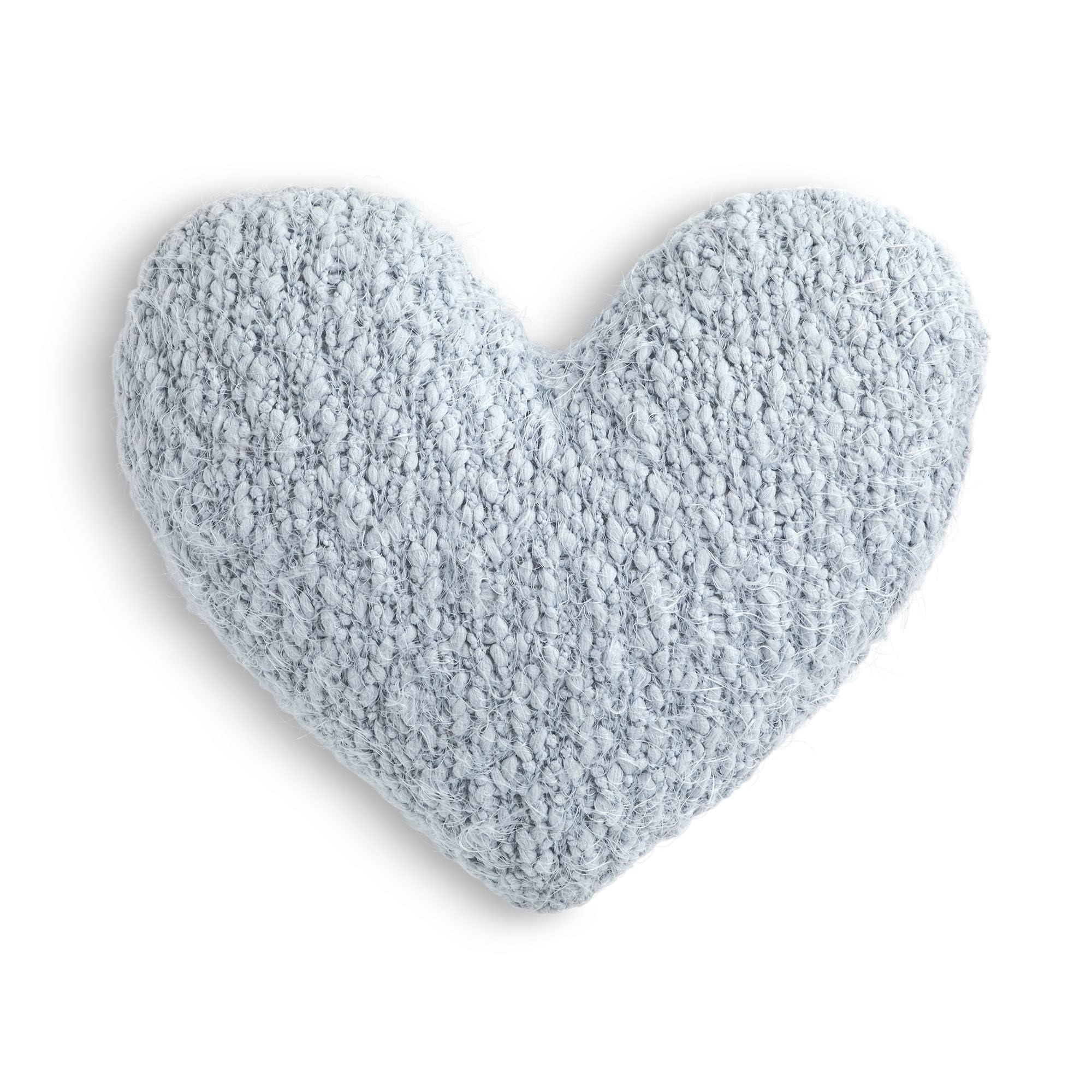 DEMDACO weighted heart pillow close-up shows handmade stitching and plush texture.