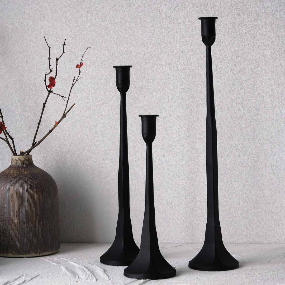 Denique iron taper candle holder set with three heights for elegant tablescapes