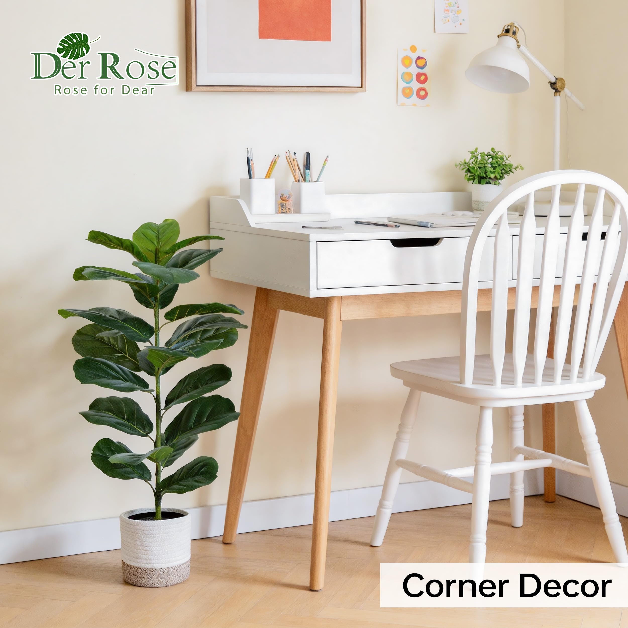 Der Rose 30-inch fiddle leaf fig tree on a desk in an office setting.