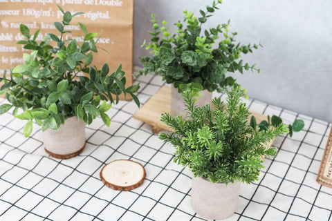 Der Rose faux plants resist fading with simple damp cloth care.