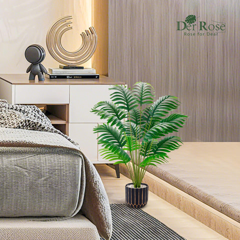Der Rose living room faux palm in premium pot brightens the space.