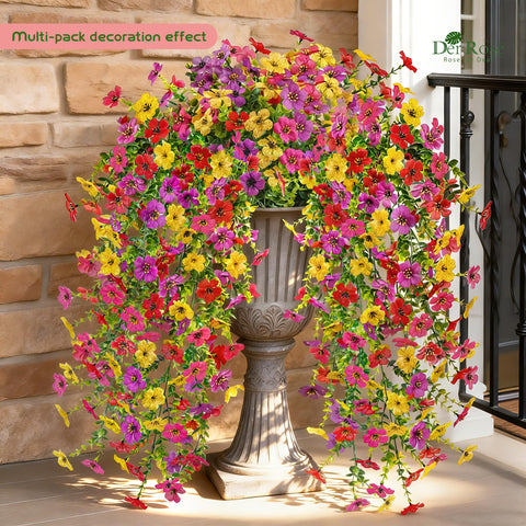 Der Rose cascading silk flowers drape over a balcony for lush outdoor decor.