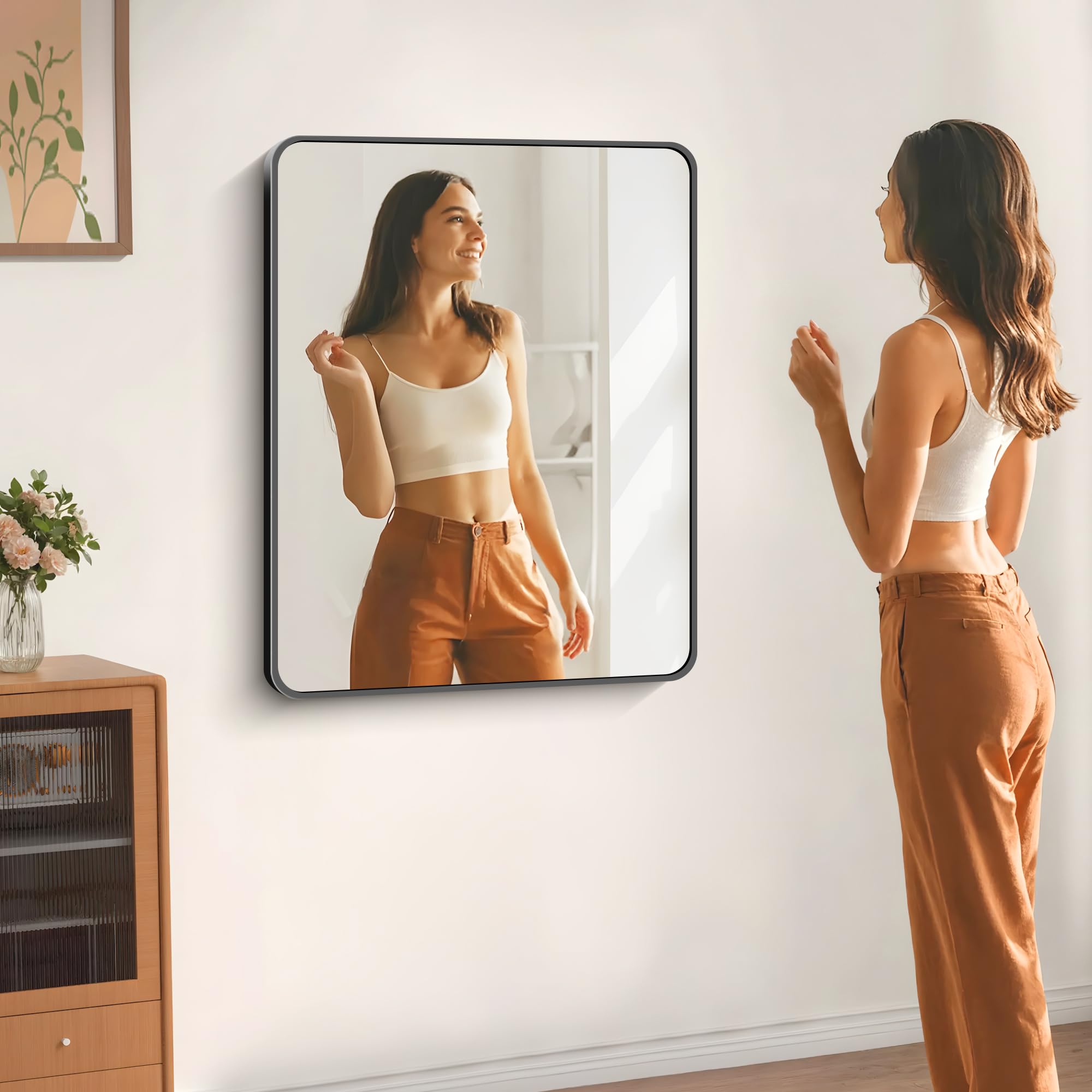 DESBING matte black frame mirror adds modern style to any bathroom.