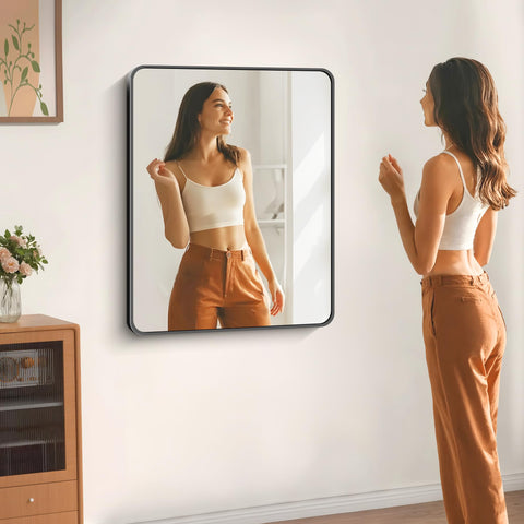 DESBING matte black frame mirror adds modern style to any bathroom.