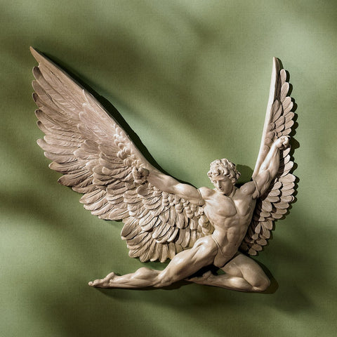 Design Toscano Icarus muscular detail wall art adds classical drama to any room.