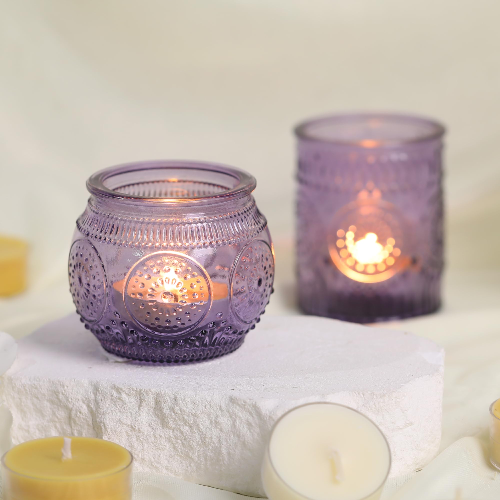 DEVI bridal shower decor in purple glass enhances party tables