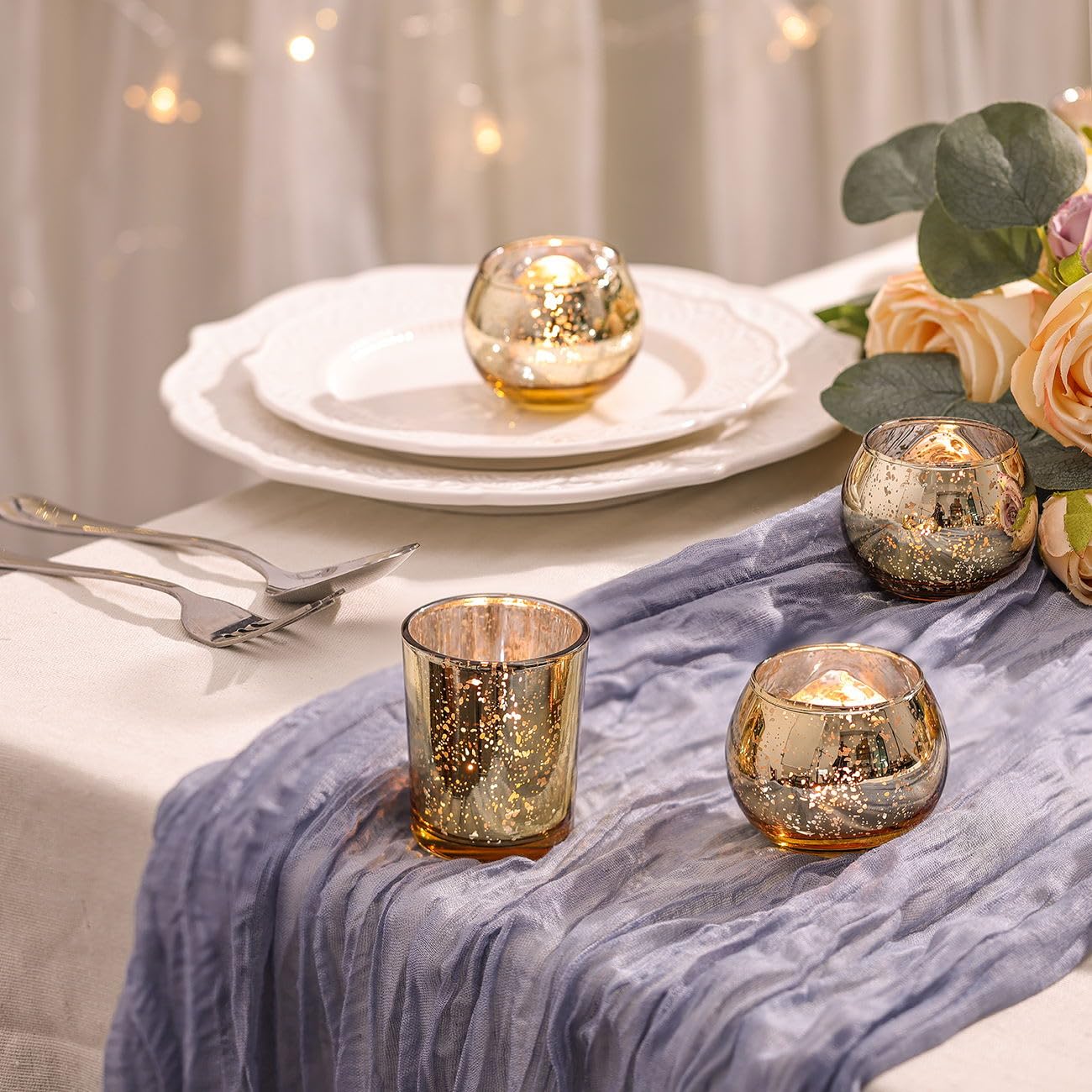 DEVI gold tealight votive holder creates sparkling candlelight.