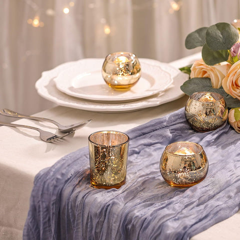 DEVI gold tealight votive holder creates sparkling candlelight.