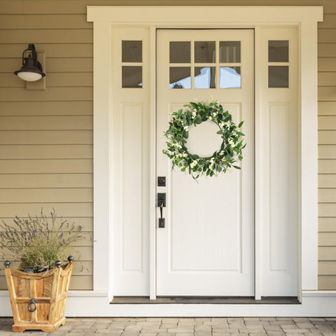 DEVONWIDE porch entrance wreath welcoming guests with greenery