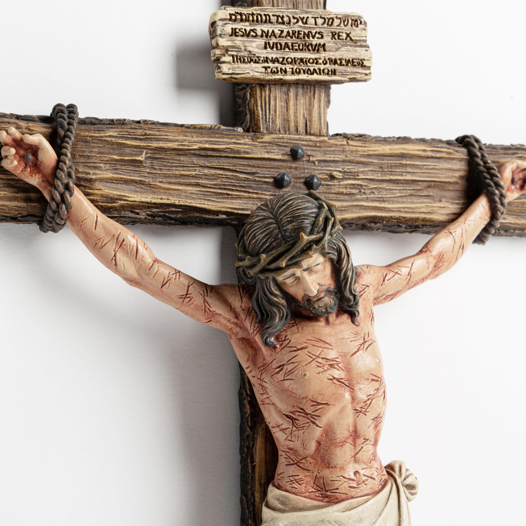 DevotedWalls crucifix durable poly-stone and resin construction.