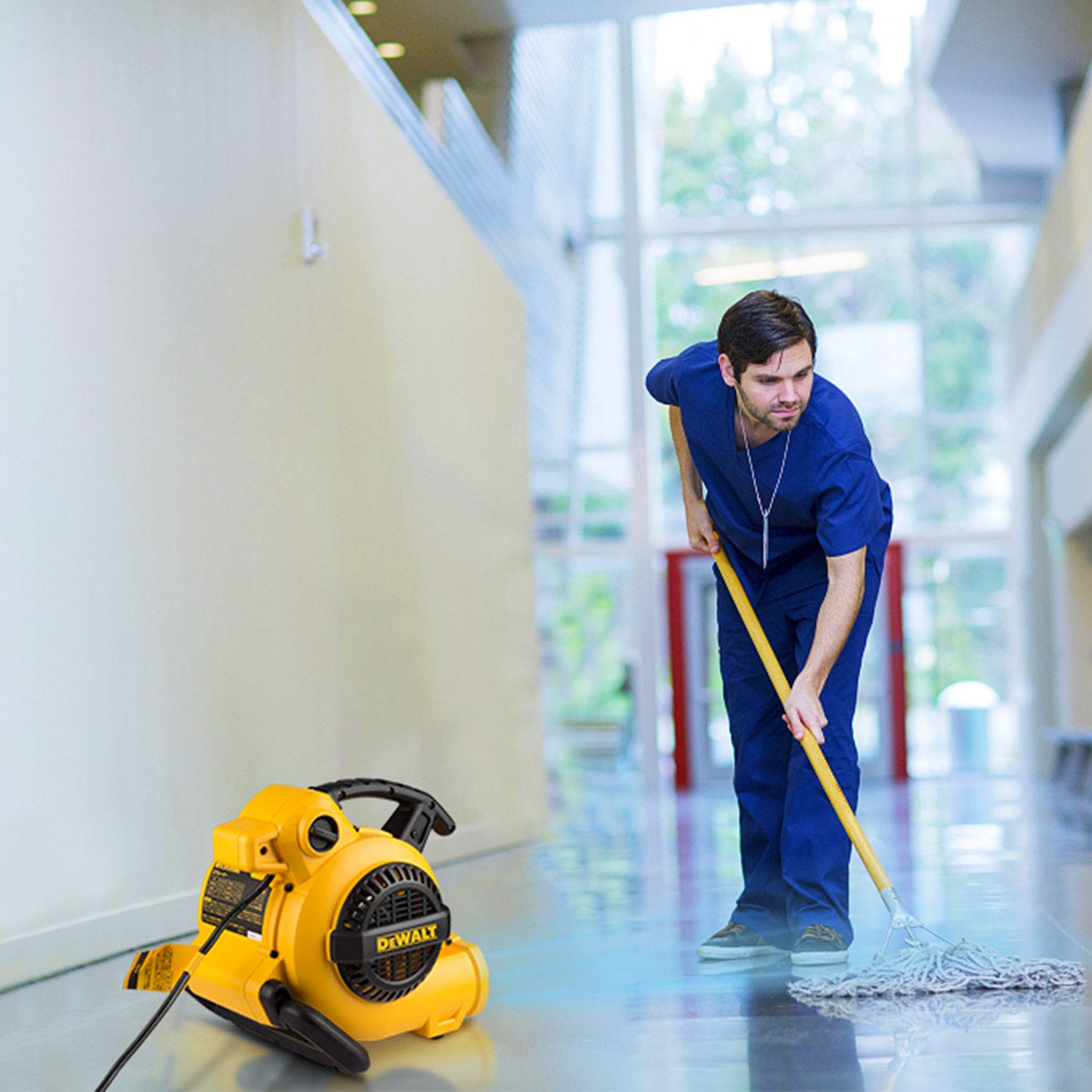 DEWALT DXAM-2260 in-use during carpet drying shows strong airflow