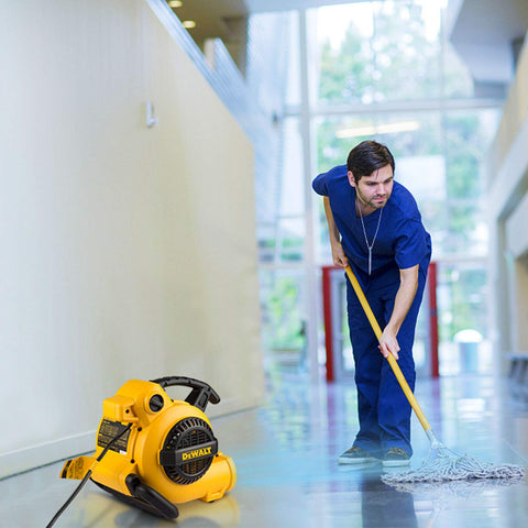 DEWALT DXAM-2260 in-use during carpet drying shows strong airflow