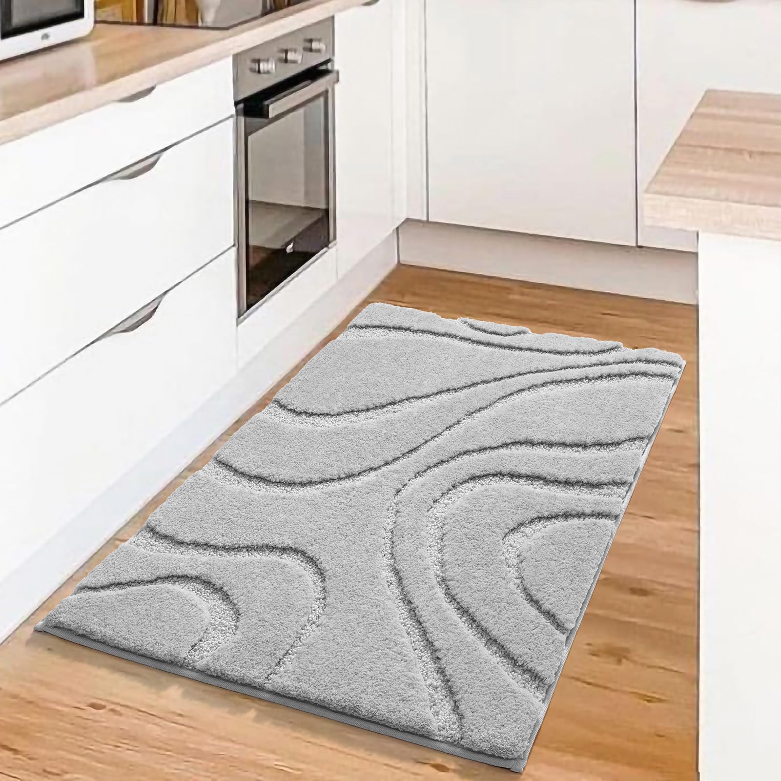 DEXDE bath rug 20x32 machine-washable for easy care.