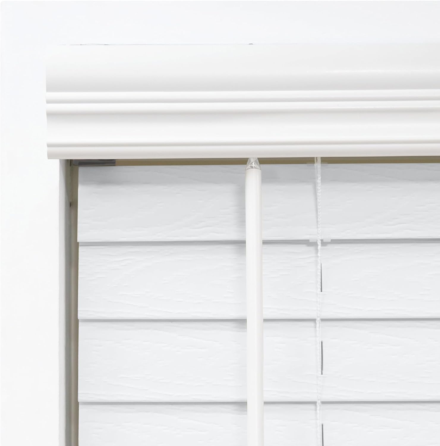 Crown valance detail on DEZ FURNISHINGS faux wood blind