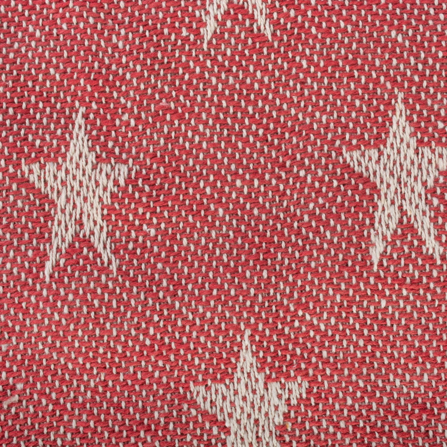 DII Star Tango Red throw on bed adds stylish warmth.