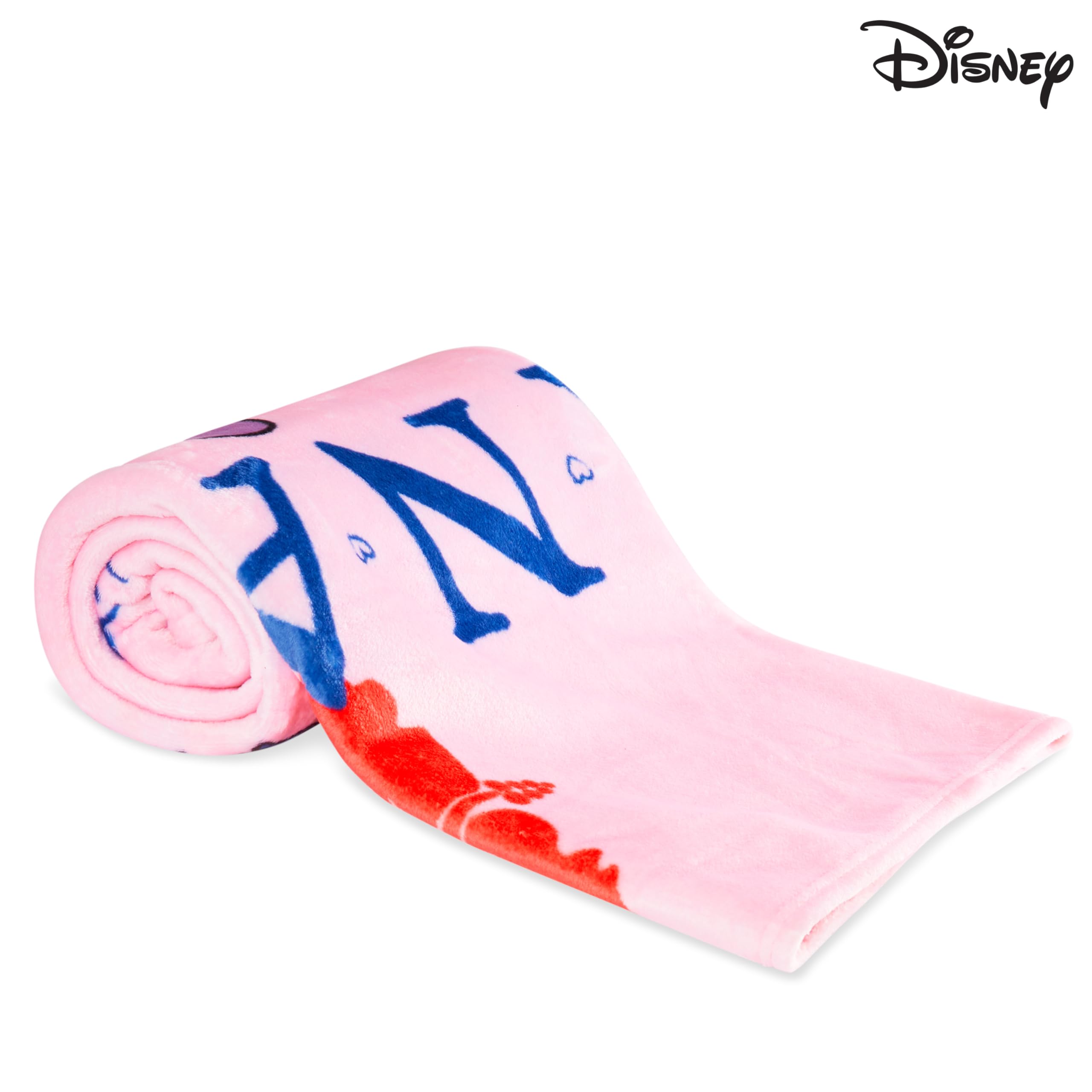 Disney Stitch throw blanket in pink adds playful bedroom décor.