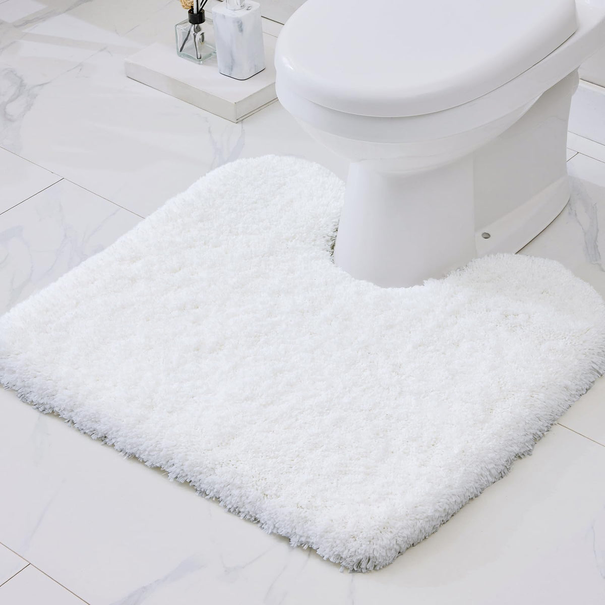 Disolla toilet mat 22x24 white with non-slip backing for secure bathroom footing.
