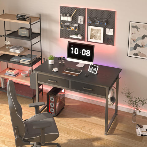 DLisiting 40-inch computer desk fits small rooms for gaming and study.