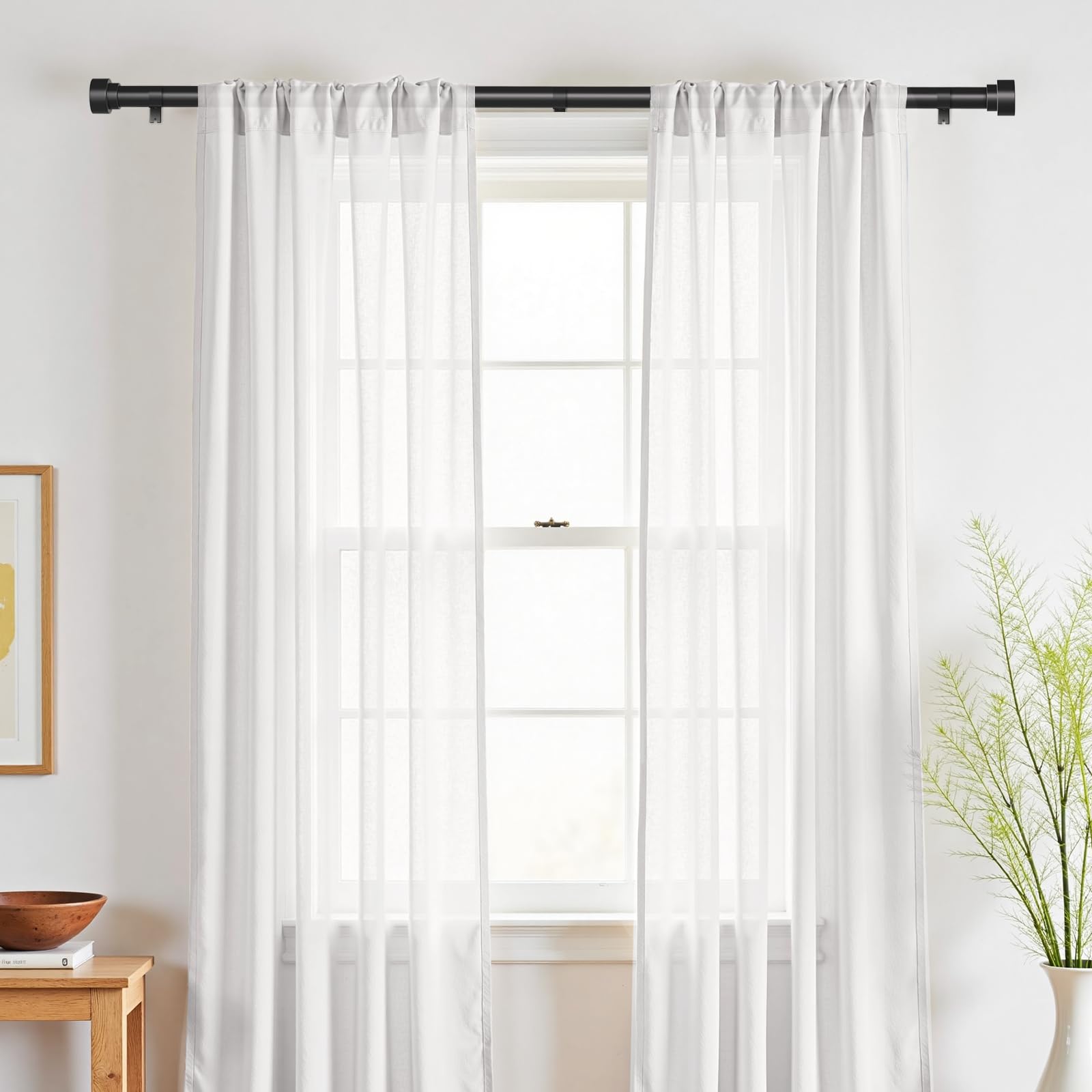 DMDG matte black curtain rod extended to fit 32-60 inches in a modern room