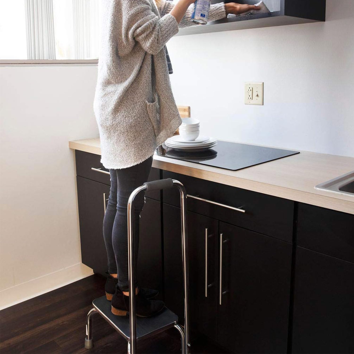 DMI Step Stool supports 300 pounds with a wide base.